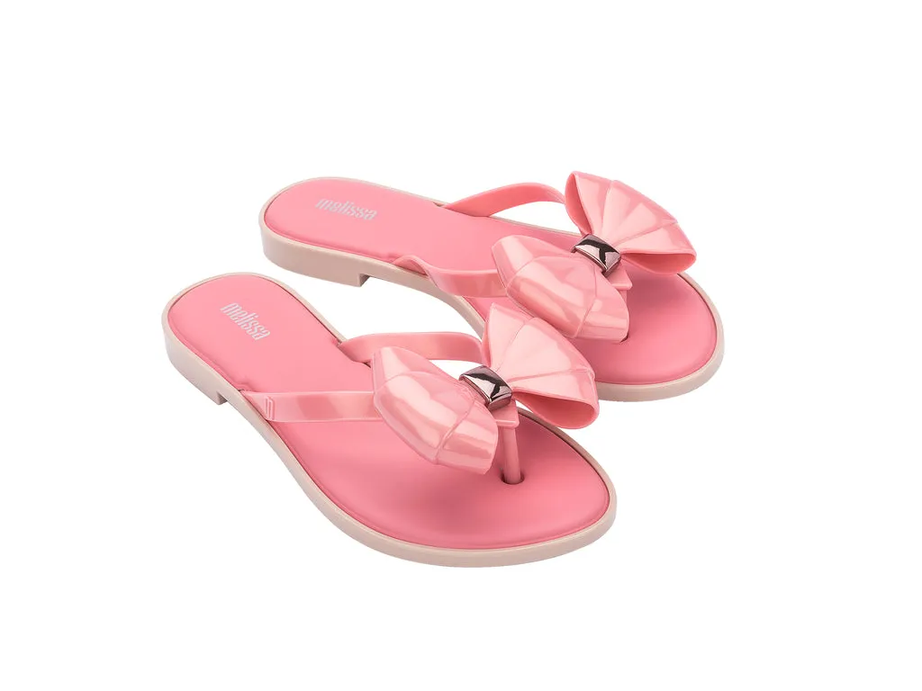 Melissa Pink Flip Flop SlIm AD With Bow