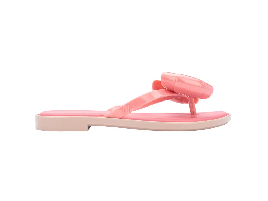 Melissa Pink Flip Flop SlIm AD With Bow